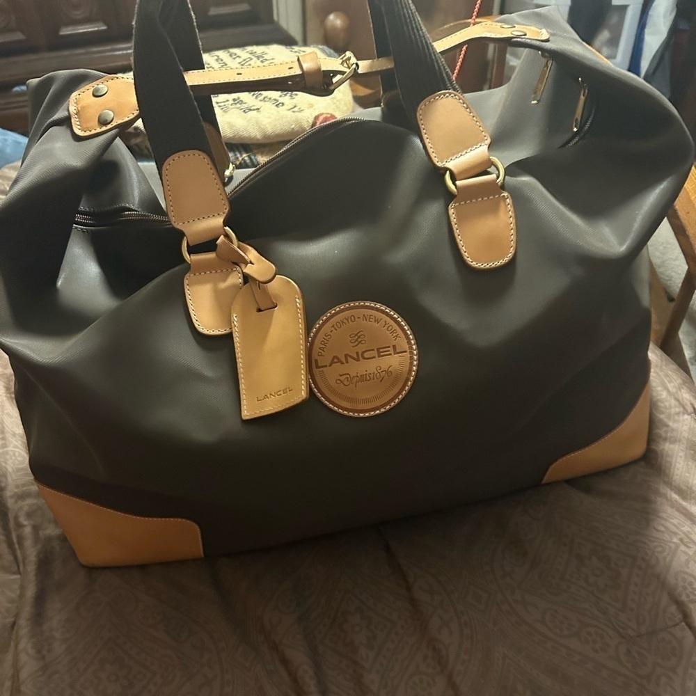 Lancel canvas luggage bag